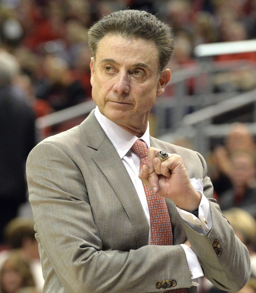Louisville head coach Rick Pitino watches his team during the second half of an NCAA college basketball game Friday, Nov. 13, 2015, in Louisville, Ky. (AP Photo/Timothy D. Easley)