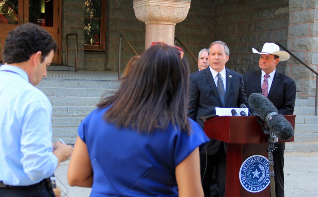 Attorney General Ken Paxton announces Carl Ferrer's arrest. Photo: Texas Attorney General’s Office